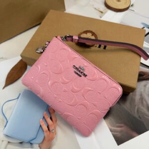 COACH CP483 pink patent embossed change handbag