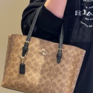 The new Mollie25 tote bag from Coach, a stylish, light-luxury versatile handbag, single-shoulder large-capacity commuter crossbody bag